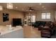 Open living space with modern lighting, comfortable seating, and seamless flow from the kitchen at 1801 S Manzanita Dr, Pahrump, NV 89048