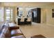 Open-concept living space with sight lines to the kitchen and an adjacent seating area at 1801 S Manzanita Dr, Pahrump, NV 89048