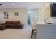 Contemporary living room with an open floor plan, counter seating and stylish decor at 1801 S Manzanita Dr, Pahrump, NV 89048