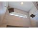 Modern shower featuring tiled walls, two shower heads, a small window, and recessed lighting at 1801 S Manzanita Dr, Pahrump, NV 89048