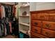 Walk-in closet with a dresser, shelving, and hanging racks perfect for organization and storage at 1801 S Manzanita Dr, Pahrump, NV 89048