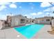 Amazing backyard featuring a sparkling pool, mature landscaping, and a detached structure at 1905 E Oakey Blvd, Las Vegas, NV 89104