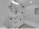 Modern bathroom featuring a white marble walk-in shower and marble countertop at 1905 E Oakey Blvd, Las Vegas, NV 89104