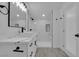 Modern bathroom featuring a white marble walk-in shower and marble countertop at 1905 E Oakey Blvd, Las Vegas, NV 89104
