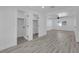 Bright bedroom featuring neutral paint, recessed lighting, and modern wood-look flooring at 1905 E Oakey Blvd, Las Vegas, NV 89104