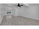 Bright bedroom featuring neutral paint, recessed lighting, and modern wood-look flooring at 1905 E Oakey Blvd, Las Vegas, NV 89104
