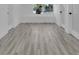 Bright bedroom featuring neutral paint, recessed lighting, and modern wood-look flooring at 1905 E Oakey Blvd, Las Vegas, NV 89104