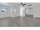 The light-filled bedroom features wood-look floors, closet with mirrored doors and white trim at 1905 E Oakey Blvd, Las Vegas, NV 89104