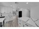 Bright kitchen with white cabinets, island with quartz countertops, and stainless steel appliances at 1905 E Oakey Blvd, Las Vegas, NV 89104