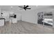 Open-concept living room adjacent to kitchen with sliding glass doors leading to pool at 1905 E Oakey Blvd, Las Vegas, NV 89104