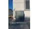 This is the air conditioner outside the house at 1905 Harvard St, North Las Vegas, NV 89030