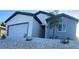 Charming single-story home with a two car garage and a low maintenance rock yard at 1905 Harvard St, North Las Vegas, NV 89030