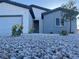 Charming single-story home with a two car garage and a low maintenance rock yard at 1905 Harvard St, North Las Vegas, NV 89030