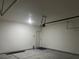 This garage is large with lighting and an automatic garage door at 1905 Harvard St, North Las Vegas, NV 89030
