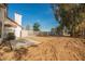 An expansive backyard with gravel and a cement slab, great for entertaining at 1917 N Moapa Valley Blvd, Logandale, NV 89021