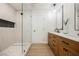 Spa-like bathroom with a glass-enclosed shower, double vanity, and modern fixtures at 1917 N Moapa Valley Blvd, Logandale, NV 89021
