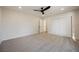 Bedroom with neutral carpet and a ceiling fan at 1917 N Moapa Valley Blvd, Logandale, NV 89021