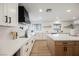 Contemporary kitchen boasting quartz countertops, custom cabinetry, and a center island with seating at 1917 N Moapa Valley Blvd, Logandale, NV 89021