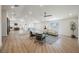 Open-concept living room with hardwood floors, high ceilings, neutral color palette, and natural light at 1917 N Moapa Valley Blvd, Logandale, NV 89021
