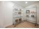 Walk-in pantry with floor-to-ceiling metal racks for storage at 1917 N Moapa Valley Blvd, Logandale, NV 89021
