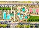 An aerial view shows a community pool, playground, basketball court and common green area at 2369 Via Barranca St, Henderson, NV 89044