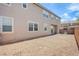 A backyard with desert landscaping provides a blank slate for future landscaping at 2369 Via Barranca St, Henderson, NV 89044