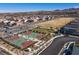 Overhead shot of basketball courts and park, highlighting community amenities and neighborhood in the background at 2369 Via Barranca St, Henderson, NV 89044