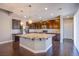 Modern kitchen featuring granite countertops and stainless-steel appliances at 2369 Via Barranca St, Henderson, NV 89044