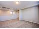 Upstairs loft area with neutral carpet and recessed lighting at 2369 Via Barranca St, Henderson, NV 89044