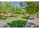 Lush green park with mature trees, walking paths, and inviting benches, creating a peaceful outdoor space at 2369 Via Barranca St, Henderson, NV 89044