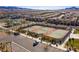 Aerial view of community tennis courts, showcasing the well-maintained facilities amidst the surrounding neighborhood at 2369 Via Barranca St, Henderson, NV 89044
