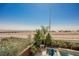 Scenic backyard view featuring a pool, lush greenery, and a serene atmosphere at 2750 Evolutionary Ln, Las Vegas, NV 89138