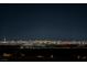 Breathtaking nighttime view of the Las Vegas skyline showcasing vibrant city lights against the dark sky at 2750 Evolutionary Ln, Las Vegas, NV 89138