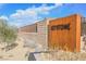 Keystone community entrance with modern signage, desert landscaping, and a stone accent wall at 2750 Evolutionary Ln, Las Vegas, NV 89138