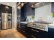 Modern kitchen featuring custom cabinets, stainless steel appliances, and white countertop at 2750 Evolutionary Ln, Las Vegas, NV 89138
