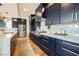 Kitchen featuring custom cabinets with a large island, stainless steel appliances, and modern countertops at 2750 Evolutionary Ln, Las Vegas, NV 89138