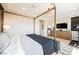 Spacious main bedroom with a cozy bed, modern dresser, and stylish decor at 2750 Evolutionary Ln, Las Vegas, NV 89138