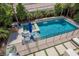 Inviting pool area with lounge chairs and a relaxing atmosphere, perfect for summer days at 2750 Evolutionary Ln, Las Vegas, NV 89138