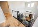 Bright staircase with modern railing, hardwood floors, and ample natural light at 2750 Evolutionary Ln, Las Vegas, NV 89138