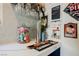 Close-up of wet bar featuring custom counter, beverage taps and chalk board with decorative wall art at 2750 Evolutionary Ln, Las Vegas, NV 89138