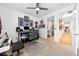 Eclectic music room featuring instruments, posters, and a connecting bathroom and hallway for easy access at 2820 High Range Dr, Las Vegas, NV 89134
