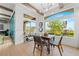 Cozy dining area with large windows showcasing the backyard, seamlessly connecting indoor and outdoor living at 2820 High Range Dr, Las Vegas, NV 89134
