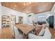 Inviting dining room with wood floors, modern lighting, and comfortable seating at 2820 High Range Dr, Las Vegas, NV 89134