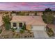 Charming single-story home with a well-manicured front yard and patio at 2820 High Range Dr, Las Vegas, NV 89134