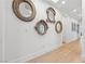 Hallway features hardwood floors and decorative mirrors, adding an artistic touch at 2820 High Range Dr, Las Vegas, NV 89134