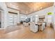 Spacious living room featuring ample natural light, hardwood flooring, and an open concept layout for entertaining at 2820 High Range Dr, Las Vegas, NV 89134