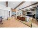 Spacious living room with an open layout, fireplace, and a seamless transition to the dining and kitchen areas at 2820 High Range Dr, Las Vegas, NV 89134