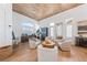 Inviting living room with wood accents, lots of natural light, and comfortable seating arrangement at 2820 High Range Dr, Las Vegas, NV 89134