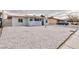 Charming single-story home featuring xeriscape front yard for low maintenance and water conservation at 3008 Lawndale St, Las Vegas, NV 89121