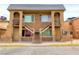 Two-story building features stairs to apartments, secure doors and windows, and a painted exterior at 3101 E Carey Ave, North Las Vegas, NV 89030